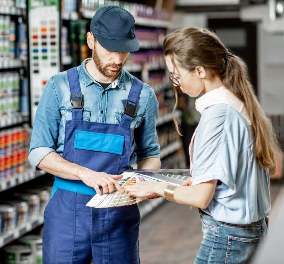 woman choosing paints in the supermarket